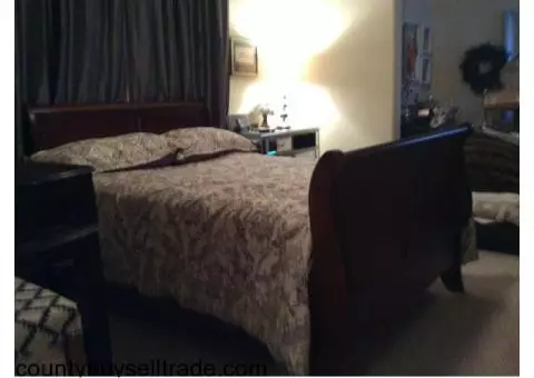 Full size bedroom set-Head Board, foot board, rails, dresser with large mirror.
